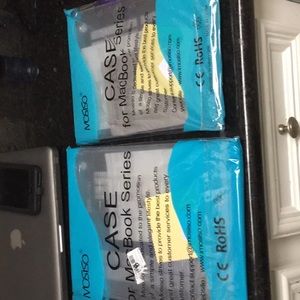 Two Mac Book Covers.